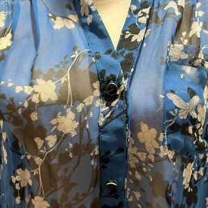 Beautiful rich royal blue 100% silk blouse.  Gently worn twice, size medium.
